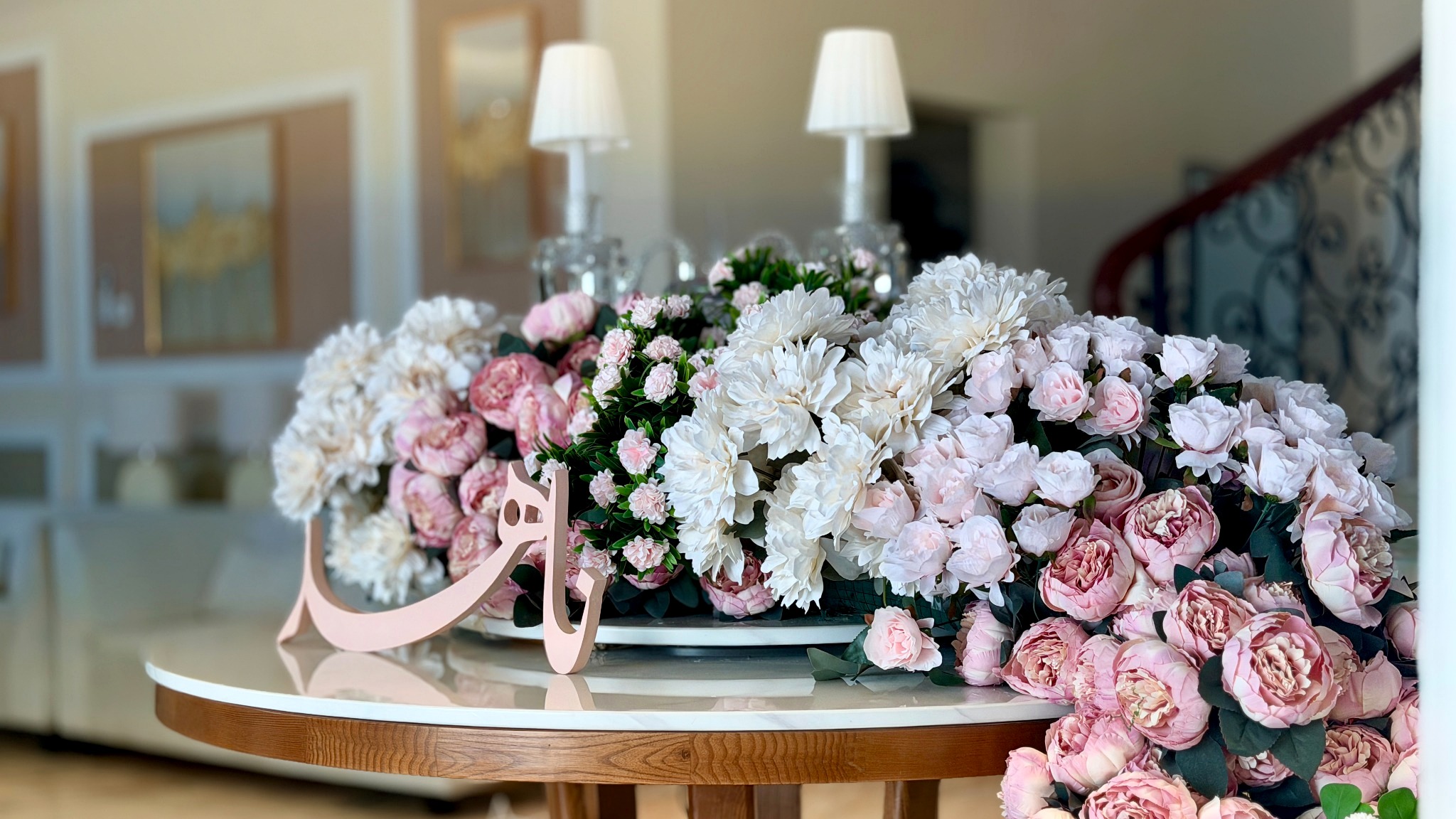 Pink and ivory floral arrangement